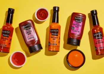 The move marks a significant step in the company’s evolution, as it continues its journey from category disruptor to undisputed household name. Nottingham based Sauce Shop, known for their innovative flavours and commitment to quality, continues to drive engagement in the sauces category. The brand has seen grocery sales increase 39.8% over the last year alone while continued distribution and product range growth propelled the brand to No12 in table sauces and condiments by value*, while building exciting new partnerships in high street food service and growing direct to consumer sales via their online website. The new look, crafted for growth, will be introduced this May. While maintaining the core elements that have helped drive success, the refresh makes the brand easier to find, instantly recognisable and communicates the differences of each sauce. Sauce Shop have been careful to ensure this is a respectful refresh, rather than a total rebrand. • Textured matte label designs have been introduced to reinforce the brands quality proposition and to help with navigation in brightly lit supermarket aisles. • Hand-drawn icons better communicate product usage suggestions and showcase tone of voice. • For their hot sauces, easy to read heat ratings are found front of pack, alongside messaging referencing the brand's unique fermented chilli ingredients. • A new bold, vibrant colour palette has been introduced throughout to aid differentiation between products, with each product now having its own unique identifying colour. Pam Digva, Co-Founder of Sauce Shop says: “We are beyond excited to see this evolution of Sauce Shop hit the shelves. It’s been 11 years since we first launched the brand on our local farmer’s market in Nottingham. Our products are now available nationwide in most supermarkets, and we needed a look that truly reflects who we are today. Sauce Shop is a brand built on flavour and quality. This refresh brings that to the forefront and ensures we continue to stand out in the category, while still looking like ourselves. Throughout the year-long design process, we’ve considered the customer at every step. Bolder product titles, added label texture, colour-coded navigation and clearer flavour notes and usage suggestions all make our range easier to shop and enjoy.” Sauce Shop’s brand refresh will coincide with a new custom designed website for an ecommerce operation that is forecast to double in revenue in 2025. The new website is quicker for users and brings improved functionality. It also brings visual consistency across all physical and digital touchpoints. For their maiden brand refresh project, Sauce Shop partnered with award-winning brand design agency, B&B Studio. Their previous projects include work for Yeo Valley Organic, Fever-Tree, Peter’s Yard, Belvoir Farm, Dalston’s, Quaker and more. Notes to editors