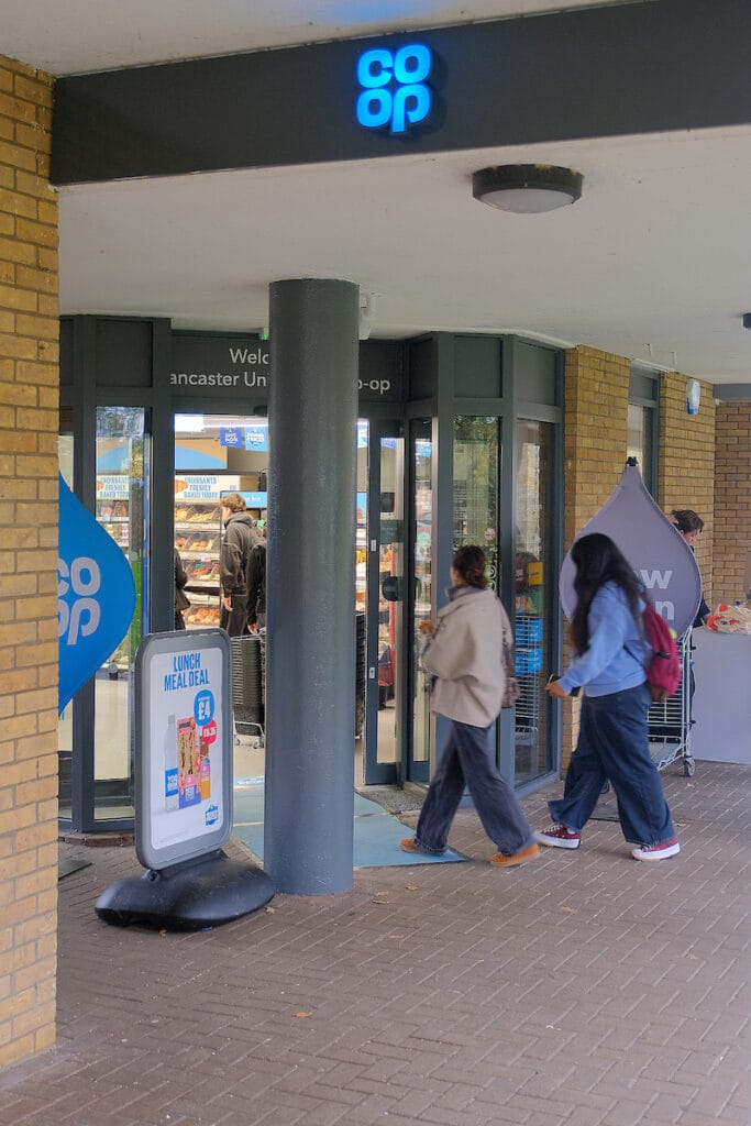 Co-op grows University Campus Stores with latest launch at Lancaster 1 Co-opThe convenience retailer and Lancaster University have worked together to launch the new store – located on the South campus - which is double the size of the previous store on site and, has been tailored to meet the needs of those living, working and visiting the site.At almost 2,500 sq ft, the layout and range has been developed to deliver a leading campus retail experience. In addition to seven permanent jobs, the store, which operates as a franchise, offers part-time and casual employment opportunities for upto 50 students.The store has a focus on food to go, including meal deals, hot food, instore bakery and Costa coffee. The diverse international student, research and teaching population will see an extended world foods range, and this sits alongside an extensive range of fresh and healthy produce, ready meals, pizzas, and everyday essentials.A focus on quick and easy customer service sees an array of 11 self-service till points. While the online delivery of groceries will be introduced soon after launch via Deliveroo and Uber Eats, with orders picked fresh in the store and delivered quickly and conveniently.Member price savings create additional value for Co-op members who can save more with personalised offers, deals and promotions - lower prices on the products shoppers buy most.Jo Hardman, Director of Commercial Services, Lancaster University, said: “Lancaster University is continually focussed on enhancing campus life for those studying, living, working, and visiting the University. Co-op have a strong ethical and sustainable ethos and we are pleased to see the launch of a new Co-op franchise store on campus which will be a welcome new addition for our campus community.”In September, Co-op saw its largest university campus store open at the University of Warwick. The launch at Lancaster takes the number of Co-op franchise stores on campus to 11.Jonathan Perry, Head of Franchise Development, Co-op, said: "We’re delighted to unveil our latest Franchise partner store at Lancaster. The store looks fantastic, with a focus on being a hub offering high-quality products, great value, ethical retailing, and tailored ranges. Working with Universities allows us to bring Co-op quality, values and, all the benefits of membership, to more young people – we are focussed on serving and supporting diverse and dynamic campus communities.“Students can also secure a 5% member discount on Co-op renters’ insurance, whether they're living in halls or sharing a house. From laptops and phones, to bikes and TVs, Co-op Insurance provides affordable cover for the valuables students rely on every day, with protection against theft, loss, and accidental damage.Co-op is one of the world’s largest consumer-owned co-operatives, with its history dating back more than 180 years. Co-op exists to create value for its membership and communities, its 7m members own the business and play an intrinsic part in the governance of the organisation.